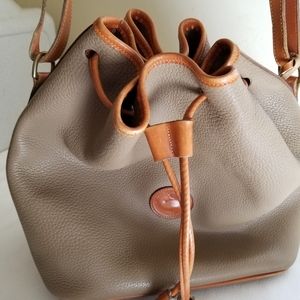 Dooney &Bourke leather draw string shoulder bag.
